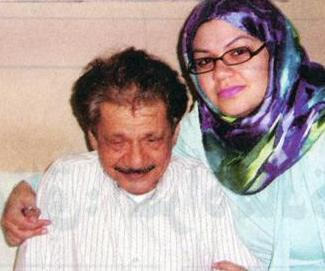 علي المفيدي مع ابنته أبرار