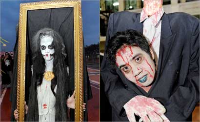  u0641u064au0644u0628u064au0646u064au0627u0646 u0645u062au0646u0643u0631u0627u0646 u0628u0645u0644u0627u0628u0633 u00abu0627u0644u0647u0627u0644u0648u064au0646u00bb u062eu0644u0627u0644 u0645u0634u0627u0631u0643u062au0647u0645u0627 u0641u064a u0645u0633u0627u0628u0642u0629 u0636u0645u062a 55 u0634u062eu0635u0627u064b u062cu0631u062a u0641u064a u0645u0627u0646u064au0644u0627 u0644u0644u0641u0648u0632 u0628u0627u0641u0636u0644 u0644u0628u0627u0633 (u0627 u0641 u0628)