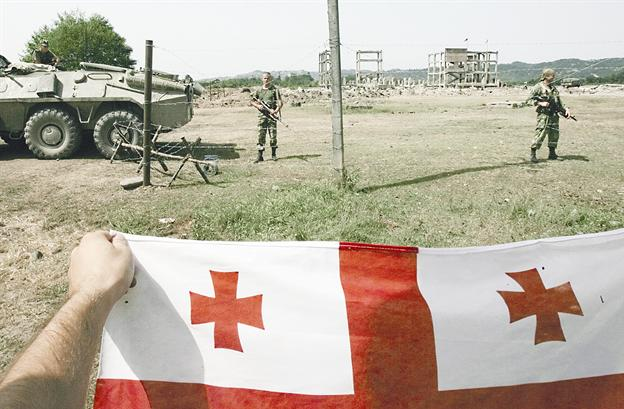 u062cu0648u0631u062cu064au0648u0646 u064au0631u0641u0639u0648u0646 u0639u0644u0645 u0628u0644u0627u062fu0647u0645 u0623u0645u0627u0645 u062cu0646u062fu064au064au0646 u0631u0648u0633u064au064au0646 u0641u064a u0628u0644u062fu0629 u062au0634u0648u0631u0648 u0634u0643u0648t (u0627 u0641 u0628)r