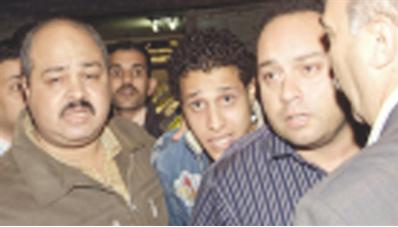 المتهم في قبضة الشرطة