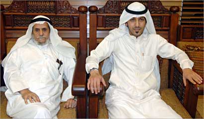 مع حفيده بدر 