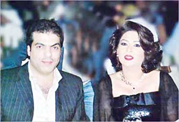 u0646u0648u0627u0644 u0645u0639 u0632u0648u062cu0647u0627 u0645u0634u0639u0644 u0627u0644u0639u0631u0648u062c  