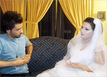 لمياء مع الزميل علاء محمود 