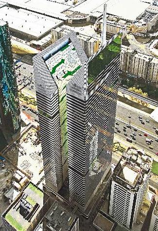 برجا «الجال» (يمين) و«نسيمة» معلم حديث في دبي