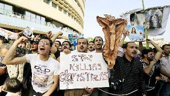 u0627u0642u0628u0627u0637 u064au062au0638u0627u0647u0631u0648u0646 u0627u0645u0627u0645 u0645u0628u0646u0649 u0627u0644u062au0644u0641u0632u064au0648u0646 u0641u064a u0627u0644u0642u0627u0647u0631u0629 u0627u062du062au062cu0627u062cu0627 u0639u0644u0649 u062au0639u0631u0636 u0643u0646u0627u0626u0633u0647u0645 u0644u0627u0639u062au062fu0627u0621u0627u062a t(u0627 u0628)