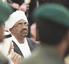 البشير 			(أ ب)