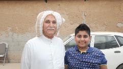 مع حفيده عبد الله