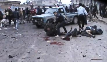 قتلى ومصابون في القصف الذي استهدف مخبزاً في حلفايا أول من أمس	 (أ ب)