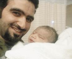 أحمد إيراج وطفله سليمان
