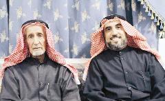 ... مع ابنه الدكتور خالد