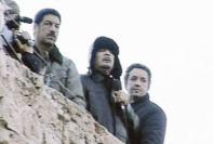 ... والى جانبه في الساحة الخضراء (سابقاً)