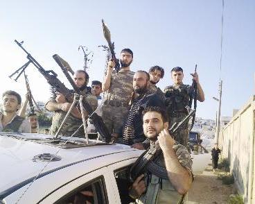 u0639u0646u0627u0635u0631 u0645u0646 u0627u0644u062cu064au0634 u0627u0644u0633u0648u0631u064a u0627u0644u062du0631 u0641u064a u0633u0631u0645u062fu0627 u0641u064a u0625u062fu0644u0628t   (u0631u0648u064au062au0631u0632)