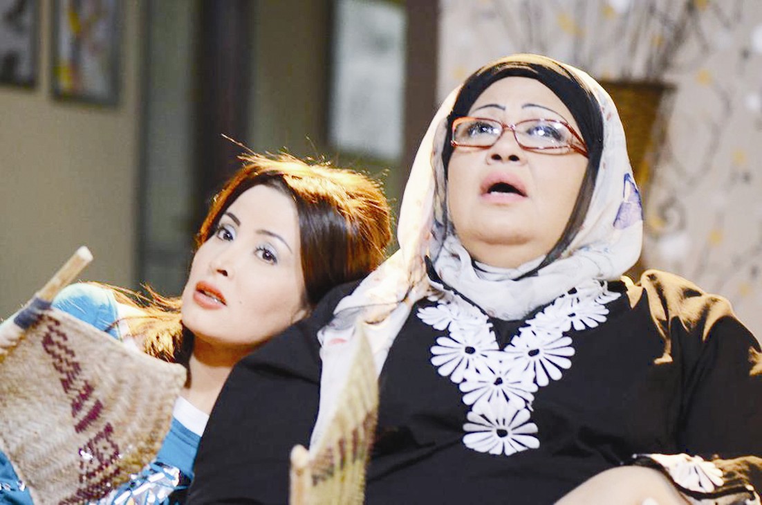 مع انتصار الشراح في مشهد من مسلسل «ريال وسط الحريم»