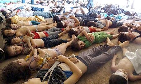 مجموعة من الأطفال قتلت في الغوطة بغازات سامة أمس 	(أ ف ب)