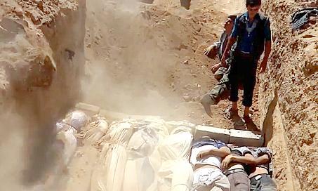 ... وبعد دفنهم جماعياً 	(أ ف ب) 