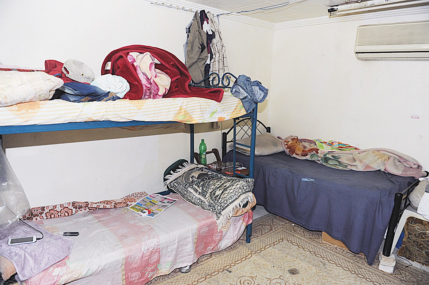 أسرّة مكدّسة في الغرف