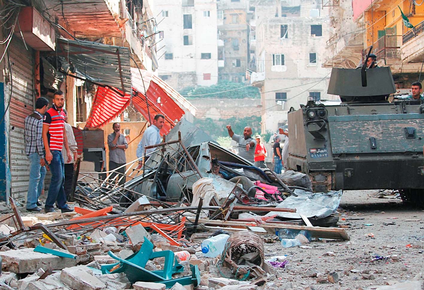 u0645u0644u0627u0644u0629 u0639u0633u0643u0631u064au0629 u0642u0631u0628 u0645u062cu0645u0648u0639u0629 u0645u0646 u0645u062fu0646u064au064au0646 u064au062au0641u0642u062fu0648u0646 u0645u0645u062au0644u0643u0627u062au0647u0645 u0628u0639u062f u0647u062fu0648u0621 u062du062fu0651u0629 u0627u0644u0645u0639u0627u0631u0643 u0641u064a u0645u062fu064au0646u0629 u0637u0631u0627u0628u0644u0633 u0628u064au0646 u0627u0644u062cu064au0634 u0648u0645u0633u0644u0651u062du064au0646 u0625u0633u0644u0627u0645u064au064au0646 (u0631u0648u064au062au0631u0632)