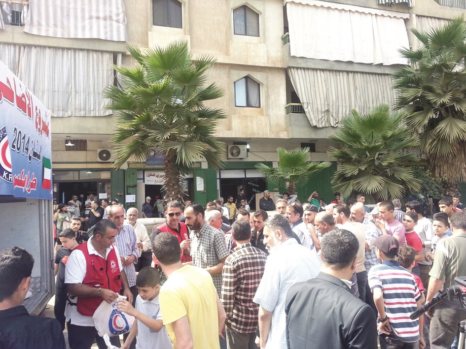 جانب من عملية توزيع الاضاحي