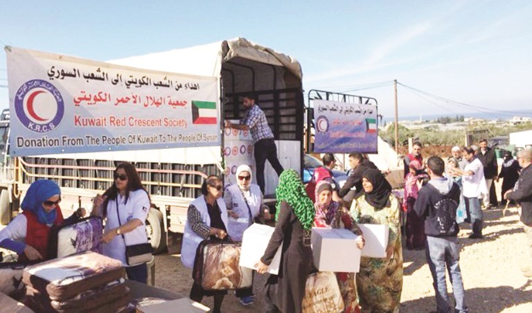 u00abu0627u0644u0647u0644u0627u0644 u0627u0644u0623u062du0645u0631u00bb u064au0648u0632u0639 u0627u0644u0645u0633u0627u0639u062fu0627u062a u0627u0644u0643u0648u064au062au064au064au0629 u0644u0644u0633u0648u0631u064au064au0646 u0641u064a u0644u0628u0646u0627u0646