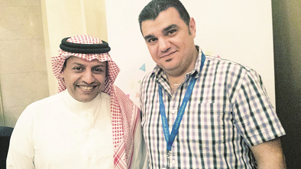 الزميل طارق ضاهر مع أسعد الزهراني