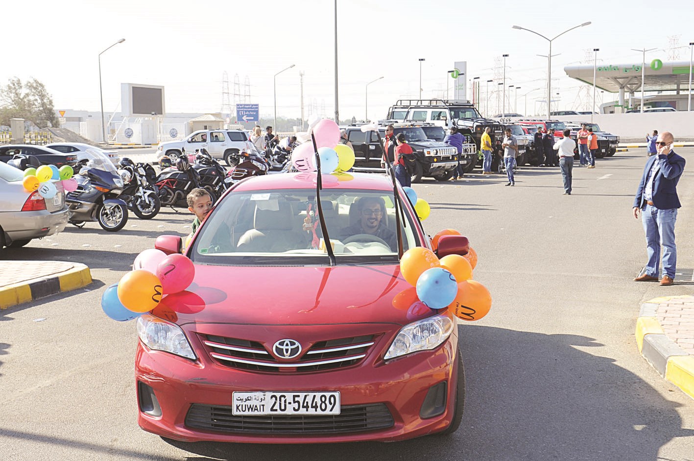 من مسيرة السيارات (تصوير جاسم بارون)