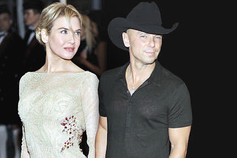 برفقة زوجها السابق كيني تشيسني