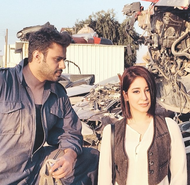 عبدالله بوشهري وأسيل عمران في أحد المشاهد