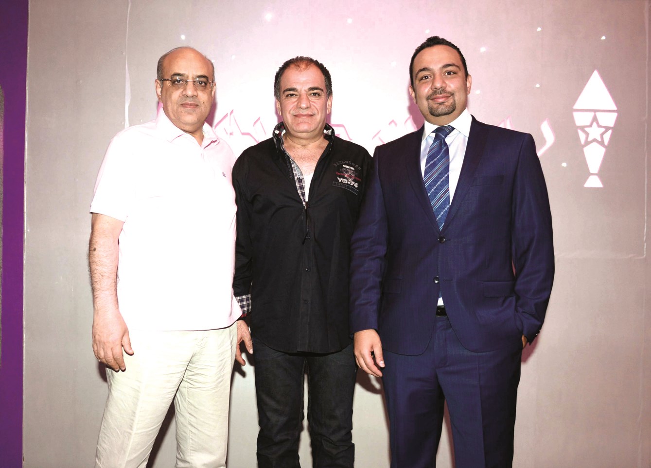 زياد مجذوب وعادل القشيشي يتوسطهما علي مازح من وكالة Graphic 4M