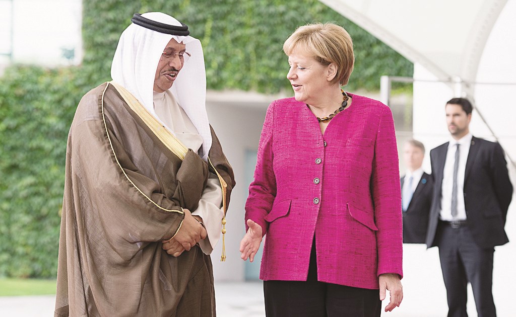 المبارك وميركل