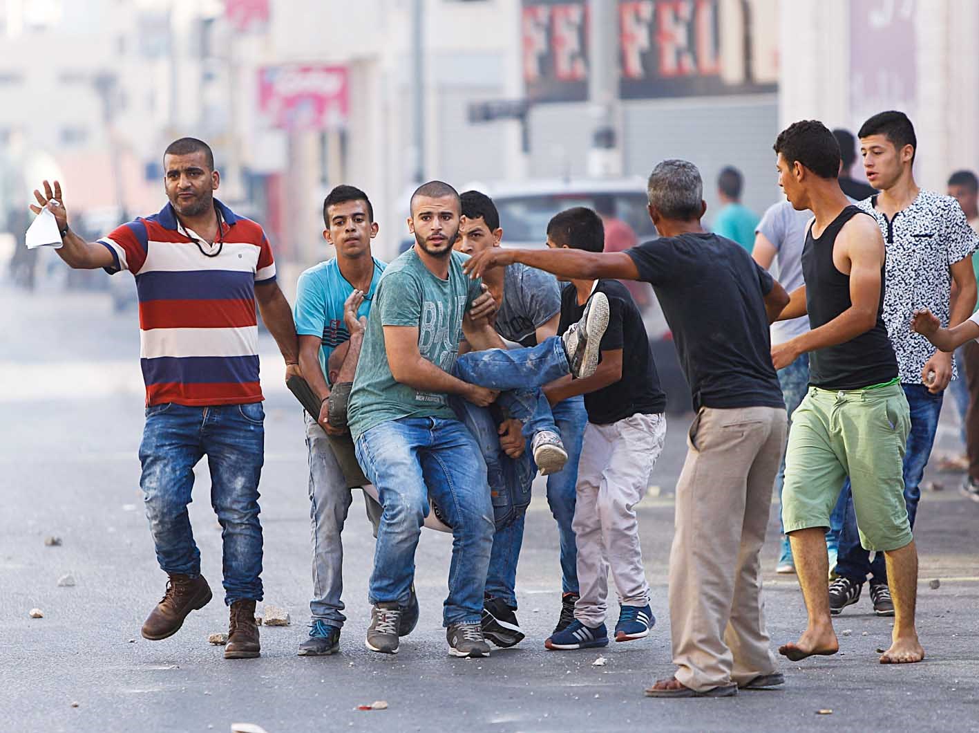 u0641u0644u0633u0637u064au0646u064au0648u0646 u064au062du0645u0644u0648u0646 u0645u0635u0627u0628u0627u064b u0628u0631u0635u0627u0635 u062cu0646u0648u062f u0625u0633u0631u0627u0626u064au0644u064au064au0646 u0641u064a u062cu0646u064au0646 ( u0627 u0641 u0628)