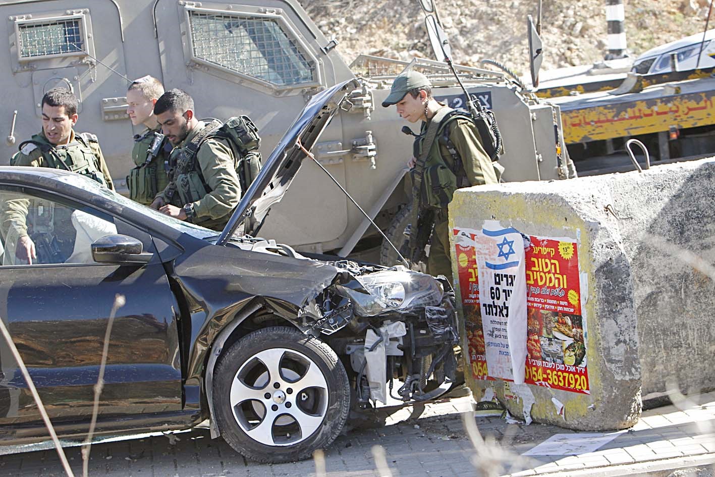 u062cu0646u0648u062f u0625u0633u0631u0627u0626u064au0644u064au0648u0646 u064au0641u062au0634u0648u0646 u0633u064au0627u0631u0629 u0627u0644u0641u0644u0633u0637u064au0646u064a u0645u0646u0641u0630 u0627u0644u0647u062cu0648u0645 (u0631u0648u064au062au0631u0632)