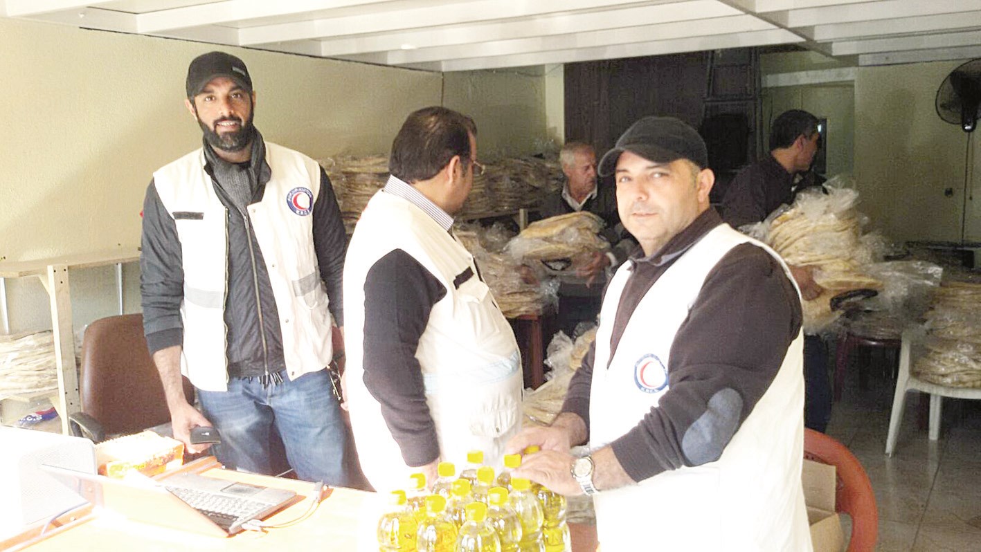 u0641u0631u064au0642 u0627u0644u0647u0644u0627u0644 u0627u0644u0623u062du0645u0631 u0644u062fu0649 u062au0648u0632u064au0639 u0627u0644u0645u0633u0627u0639u062fu0627u062a