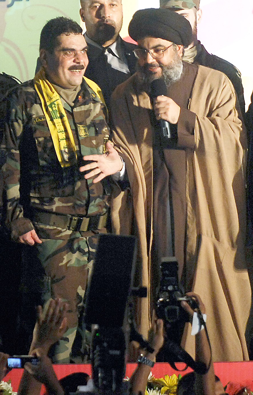 مع الأمين العام لـ «حزب الله» السيد حسن نصرالله (أ ب)