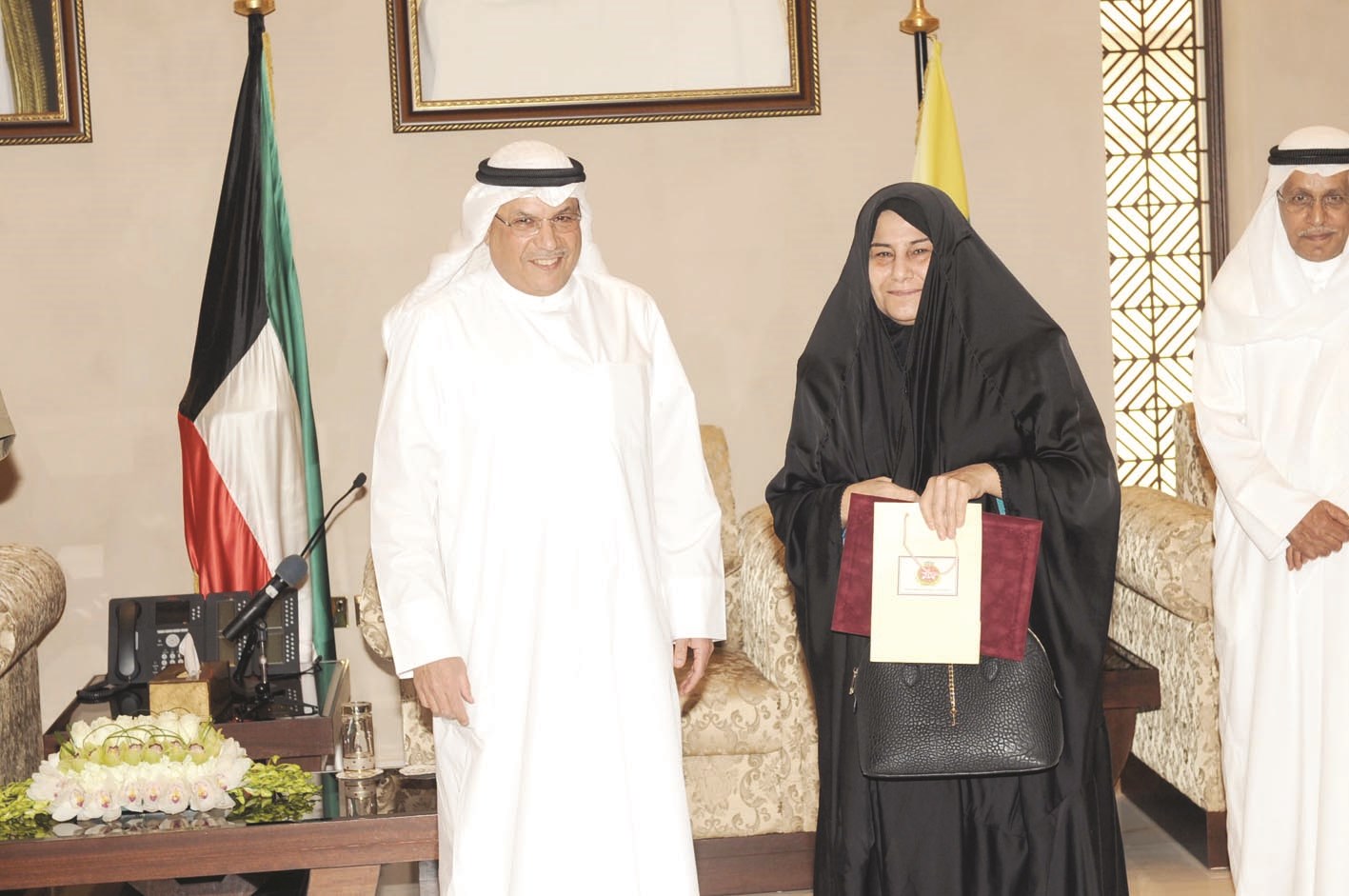 الجراح ووالدة أحد الشهداء