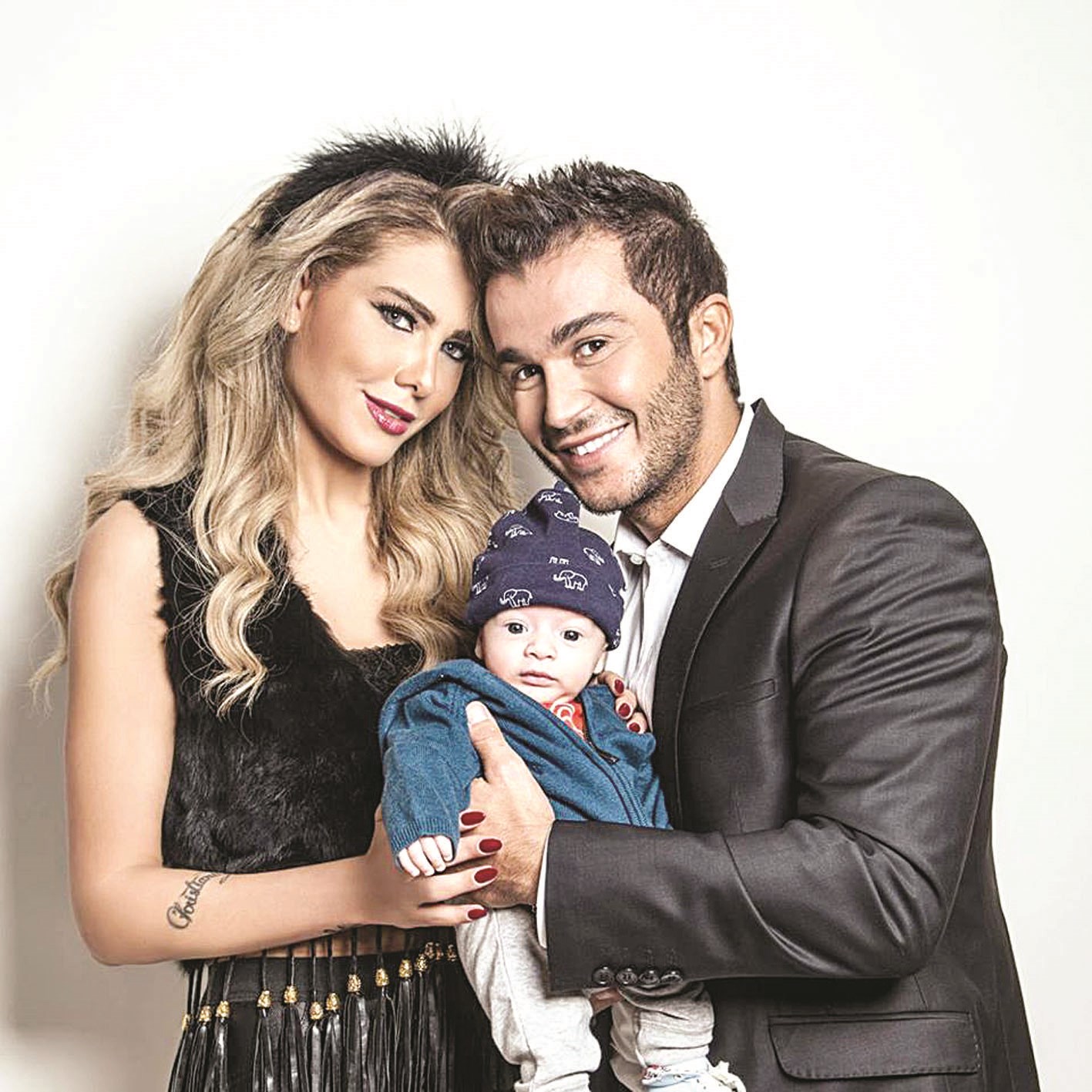 جويل مع جورج الراسي وابنهما قبل الطلاق