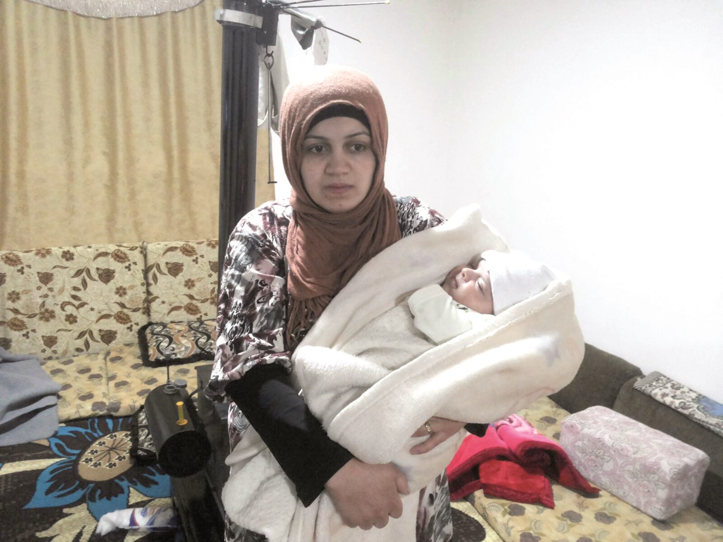 رسمية زوجة الناطور وطفلها روت قصة الخطف