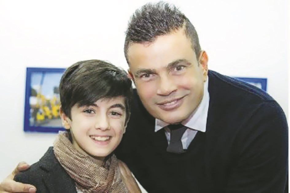 عمرو دياب حرص على لقاء المغني الصغير في بوخارست