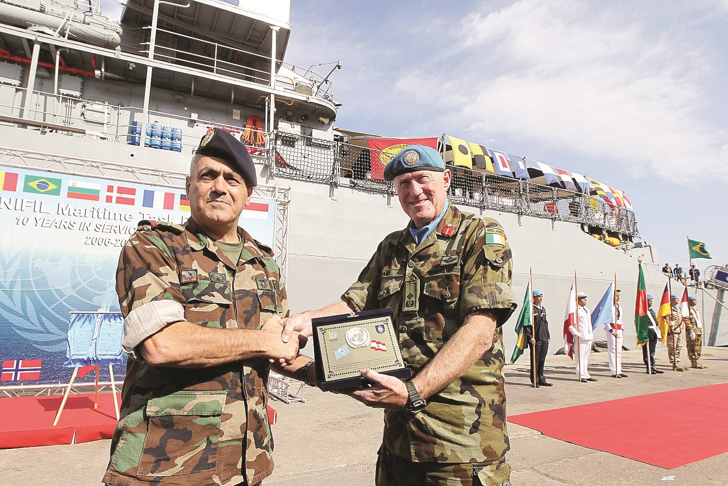 u0645u0635u0627u0641u062du0629 u0648u062fu0631u0639 u062au0630u0643u0627u0631u064au0629 u0628u064au0646 u0636u0627u0628u0637u064au0646 u0644u0628u0646u0627u0646u064a u0648u062fu0648u0644u064a u062eu0644u0627u0644 u0627u0644u0627u062du062au0641u0627u0644 u0628u0627u0644u0630u0643u0631u0649 u0627u0644u0639u0627u0634u0631u0629 u0644u0625u0646u0634u0627u0621 u0628u062du0631u064au0629 u00abu0627u0644u064au0648u0646u064au0641u064au0644u00bb u0641u064a u0644u0628u0646u0627u0646  (u062f u0628 u0627)