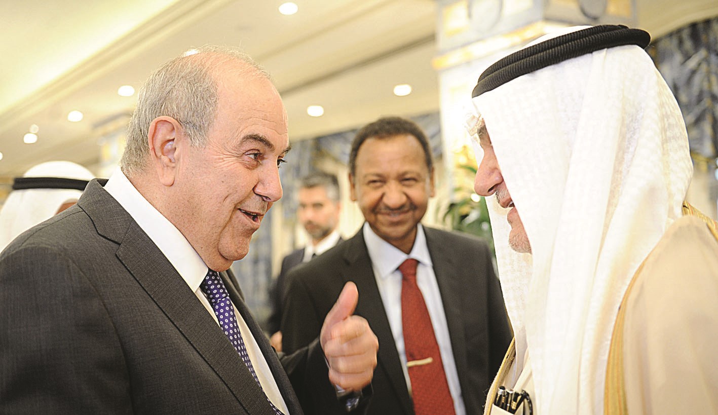 تركي الفيصل وعلاوي وبينهما مصطفى عثمان