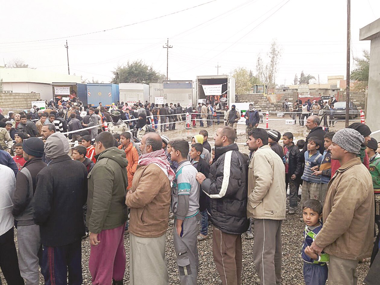 u062au0648u0632u064au0639 u0627u0644u0645u0633u0627u0639u062fu0627u062a u0639u0644u0649 u0627u0644u0644u0627u062cu0626u064au0646 u0627u0644u0639u0631u0627u0642u064au064au0646