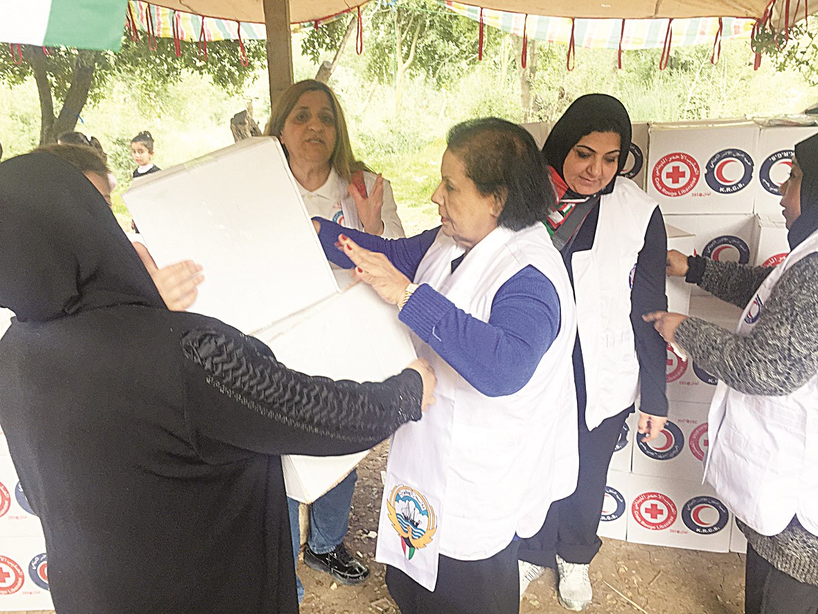 توزيع المساعدات على اللاجئين في إقليم الخروب