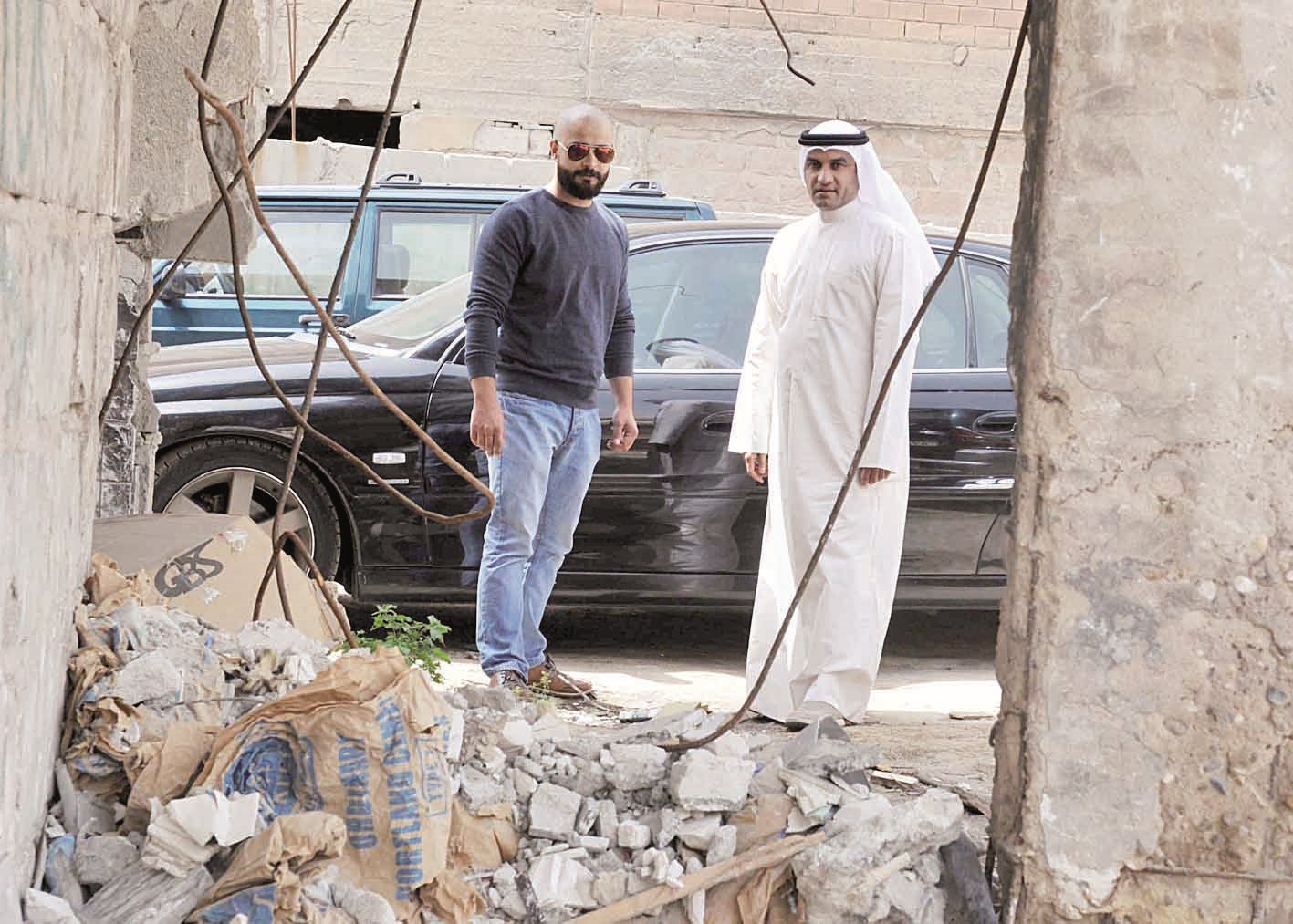 الكندري والزميل محمد أنور أمام إحدى الدورات