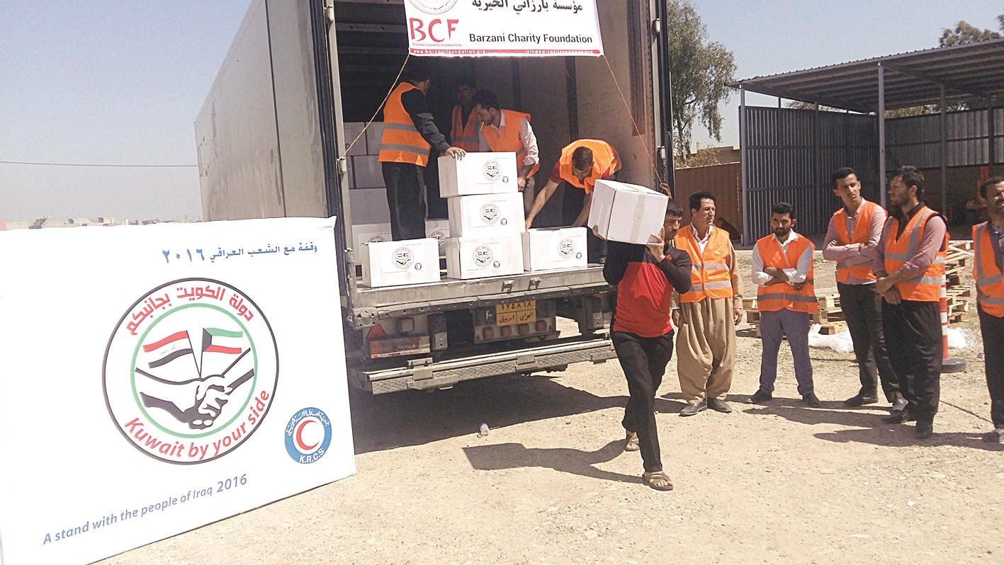 جانب من توزيع 900 سلة غذائية في أربيل