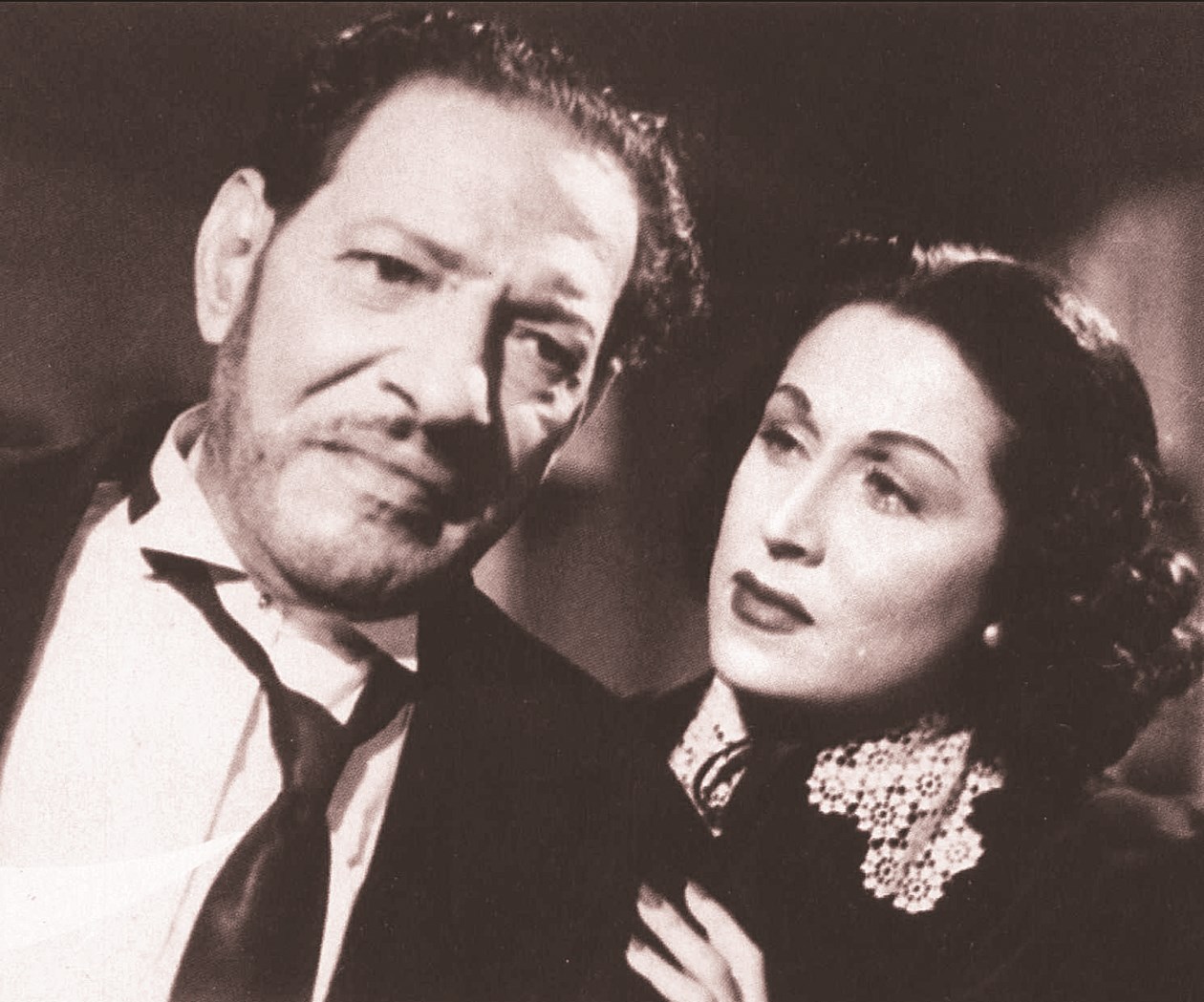 ليلى مراد ونجيب الريحاني في «غزل البنات»