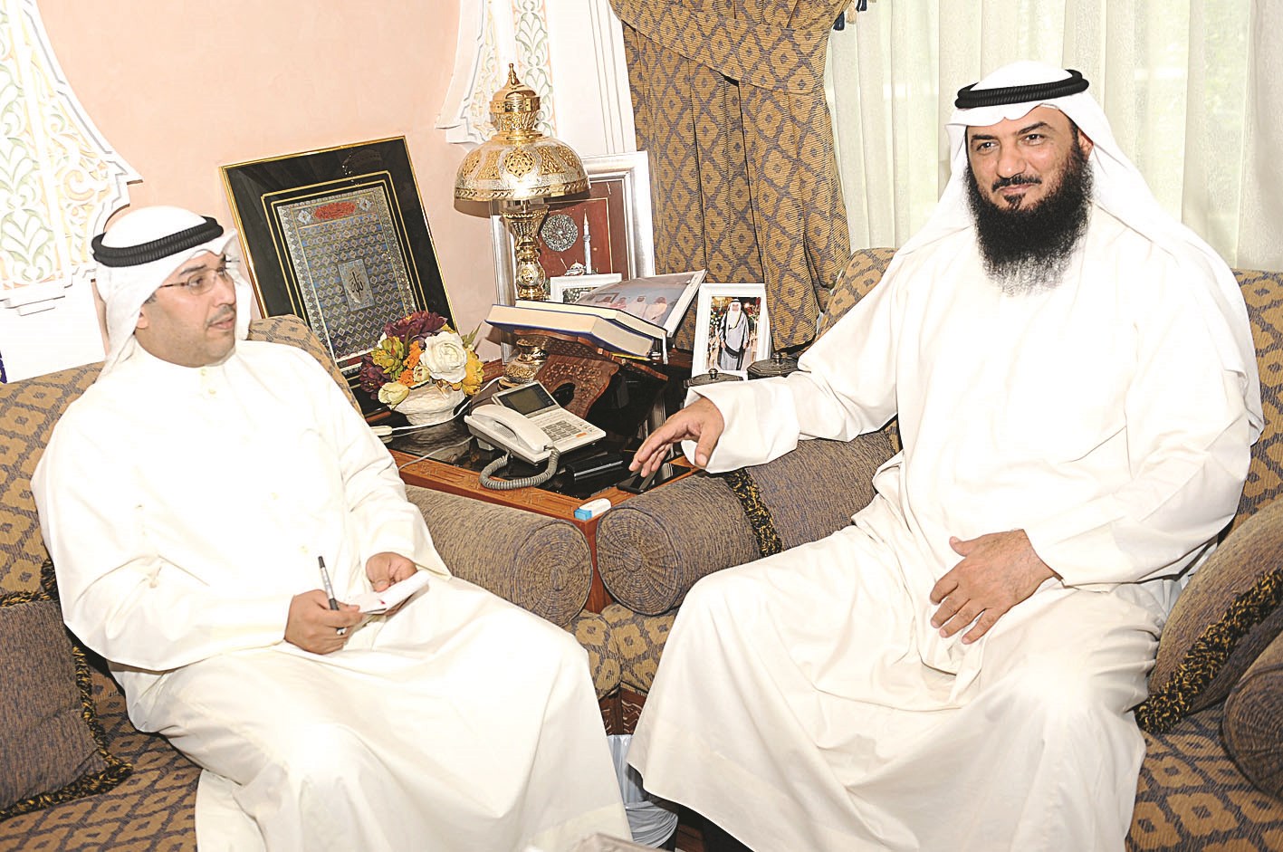 الخنة متحدثا الى الزميل وليد الهولان