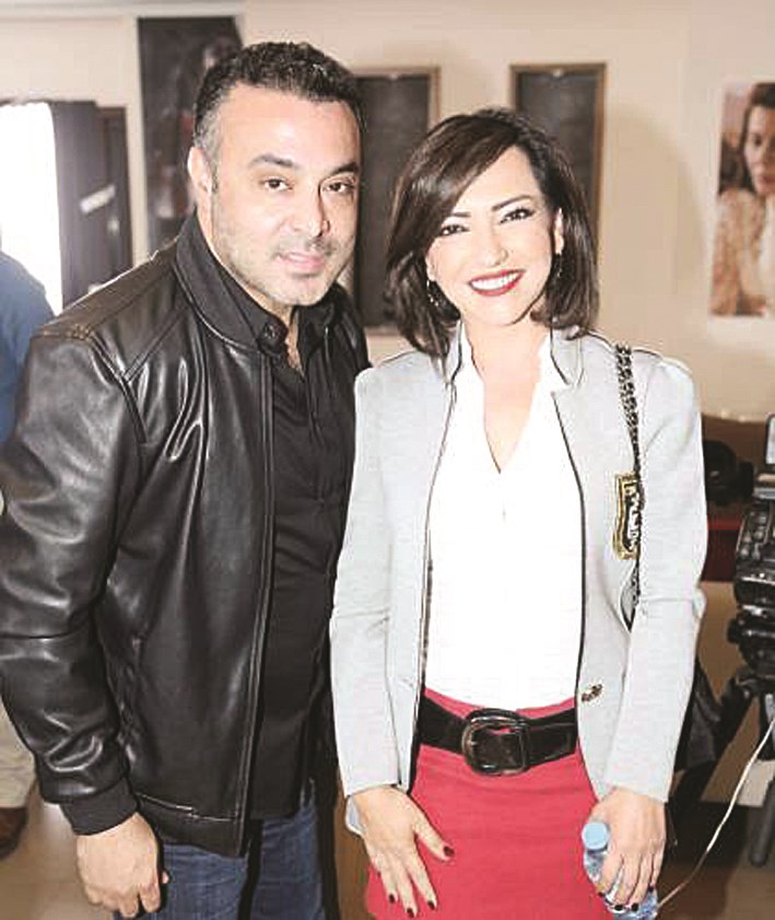 مفيد الرفاعي وأمل عرفة