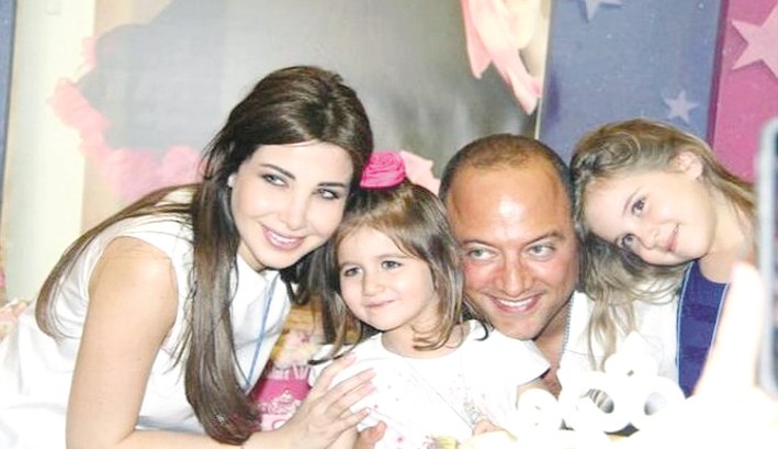 u0646u0627u0646u0633u064a u0648u0639u0627u0626u0644u062au0647u0627