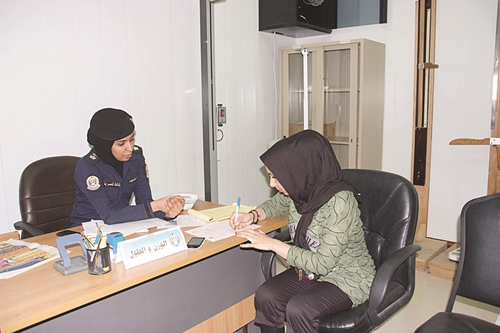 ملء استمارة فحص القبول للوزن والطول