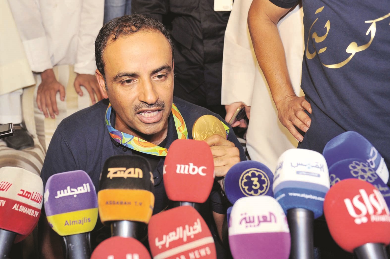 الديحاني متحدثاً إلى وسائل الإعلام