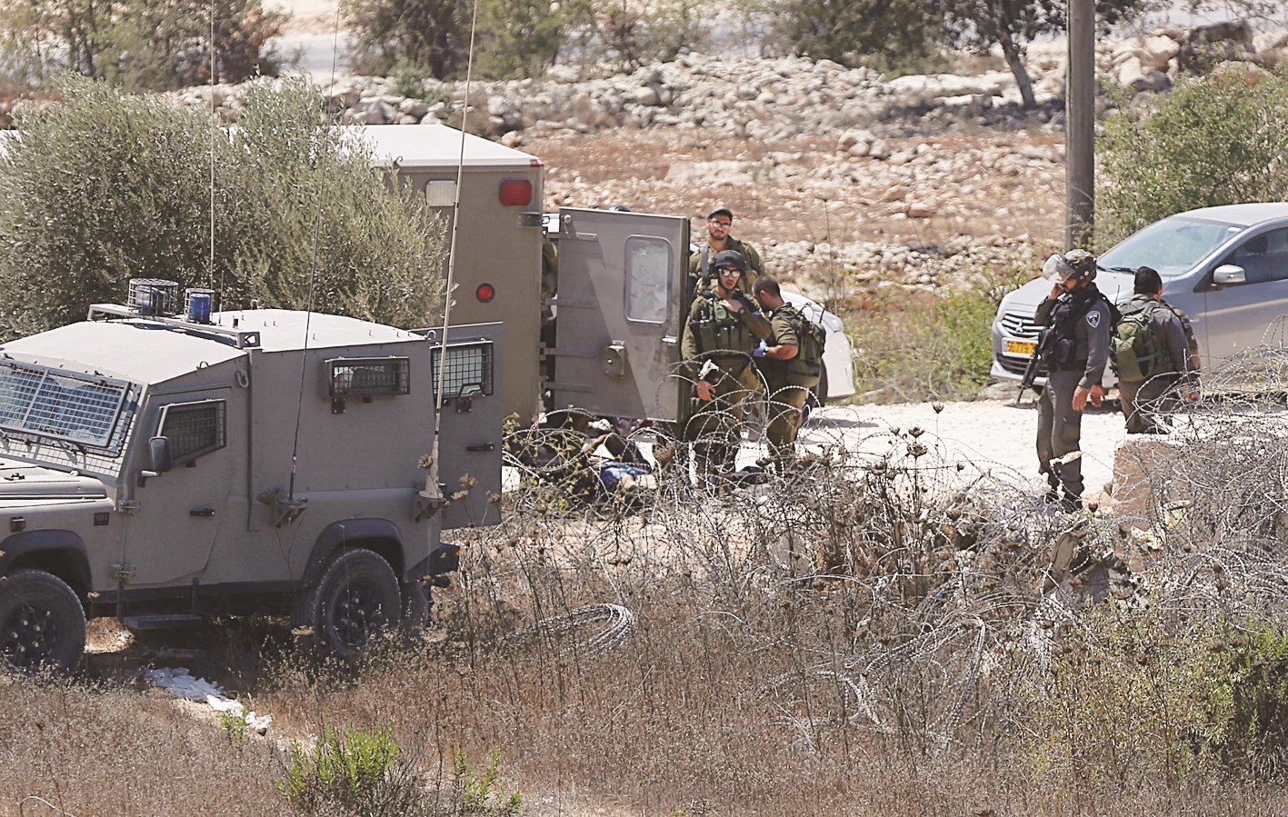 u062cu0646u0648u062f u0625u0633u0631u0627u0626u064au0644u064au0648u0646 u064au062du064au0637u0648u0646 u0628u062cu062bu0629 u0627u0644u0641u0644u0633u0637u064au0646u064a u0639u0646u062f u0645u062fu062eu0644 u0628u0644u062fu0629 u0633u0644u0648u0627u062f u0641u064a u0627u0644u0636u0641u0629 u0627u0644u063au0631u0628u064au0629    (u0627 u0641 u0628)